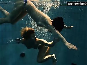 2 cool amateurs showcasing their figures off under water